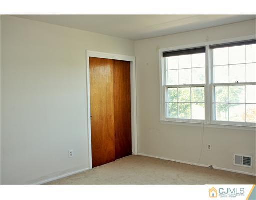 26 Ridge Road Edison, NJ 08817 - Photo 15 of 23 an empty room with windows