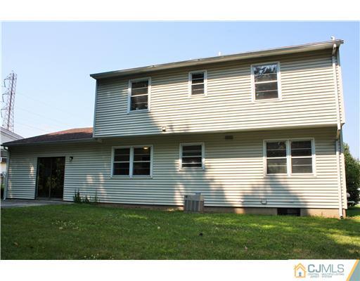 26 Ridge Road Edison, NJ 08817 - Photo 23 of 23 a view of a house with a yard
