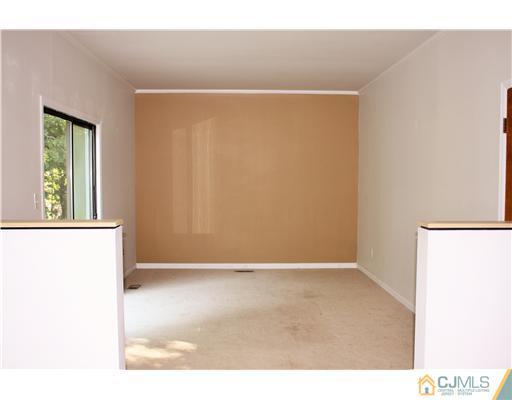 26 Ridge Road Edison, NJ 08817 - Photo 8 of 23 a view of an empty room