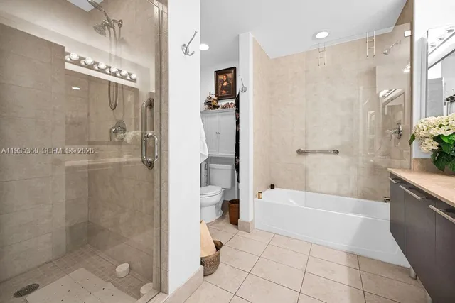 a utility room with two sink and a washer dryer