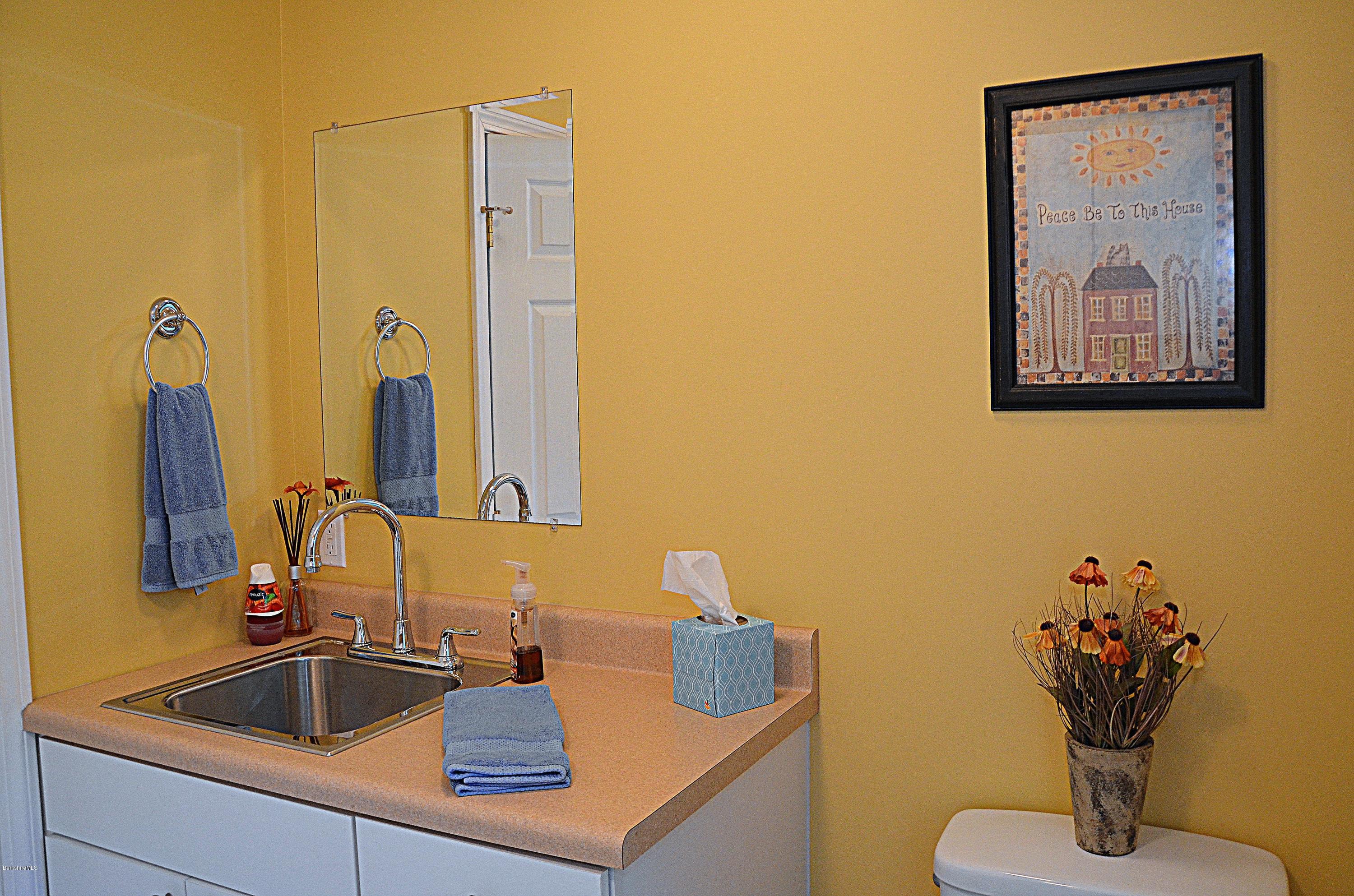 735 Upper Valley Road Washington, MA 01223 - Photo 17 of 33 a bathroom with a sink and a mirror