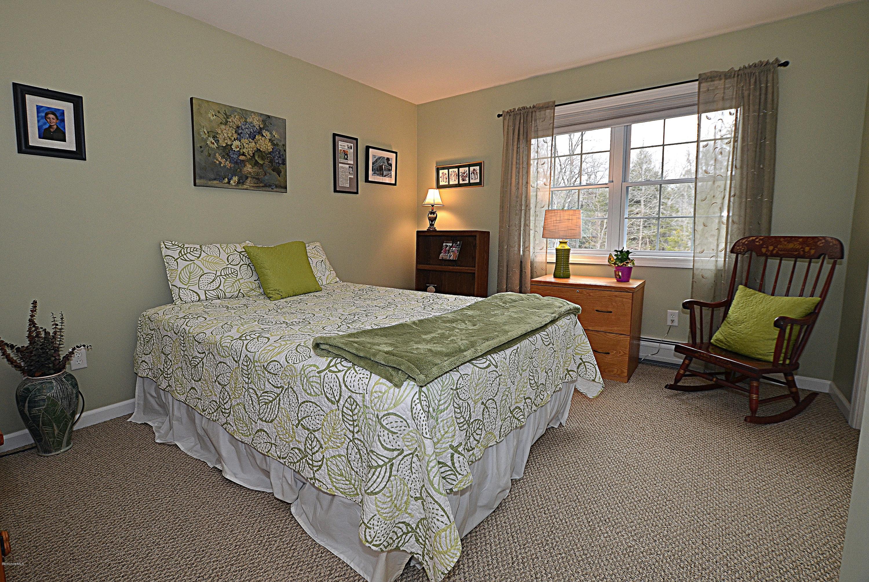735 Upper Valley Road Washington, MA 01223 - Photo 23 of 33 a bedroom with a bed chair and a desk