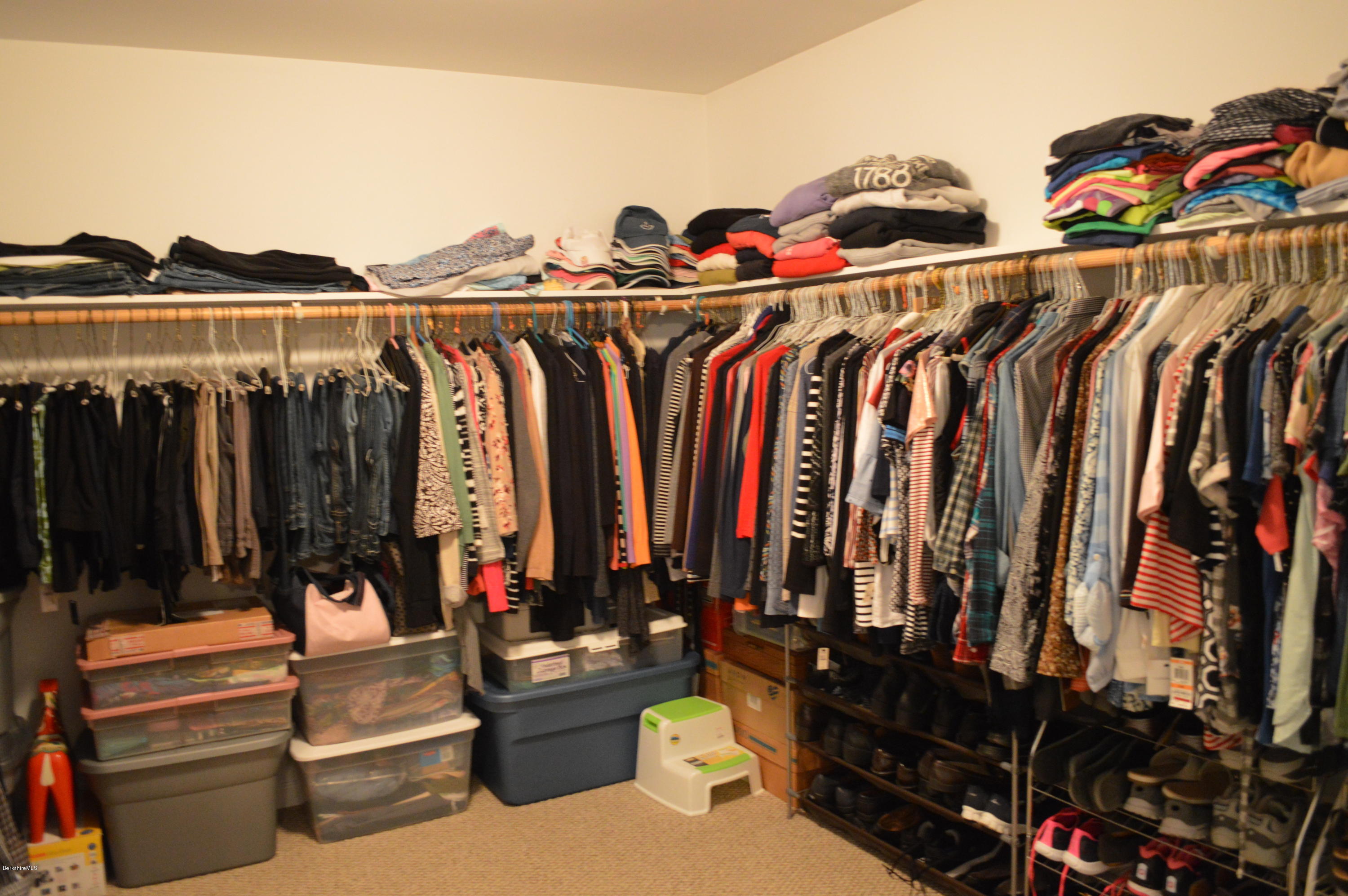 735 Upper Valley Road Washington, MA 01223 - Photo 29 of 33 a view of walk in closet with clothes and shoes