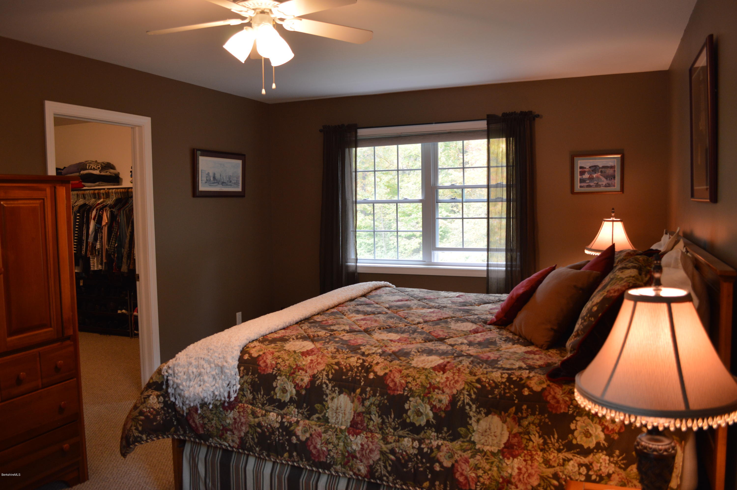735 Upper Valley Road Washington, MA 01223 - Photo 30 of 33 a bed sitting in a bedroom next to a window