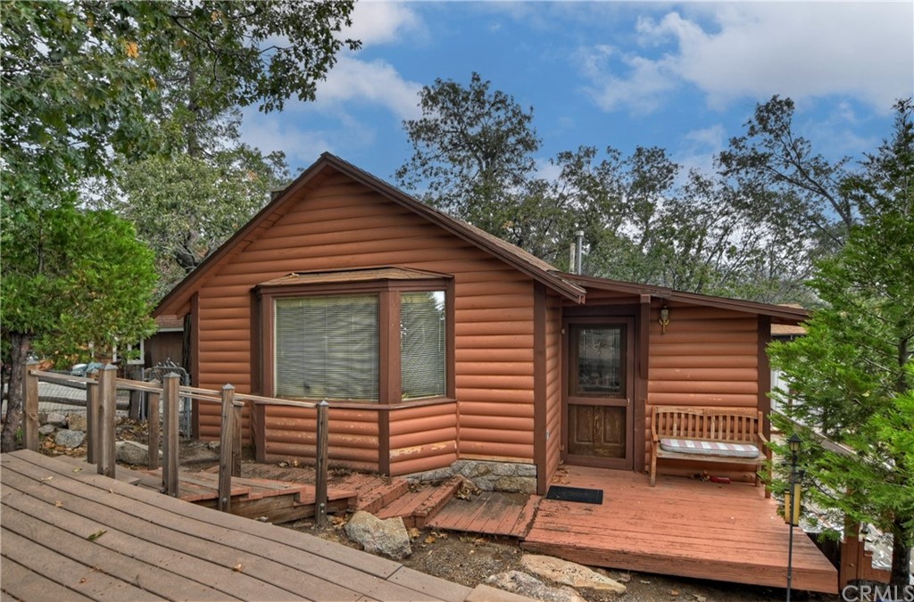 1211 Bridal Path Rimforest, CA 92378 - Photo 1 of 28 a view of a house with a yard