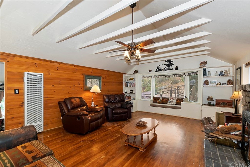 1211 Bridal Path Rimforest, CA 92378 - Photo 11 of 28 a living room with furniture and a large window