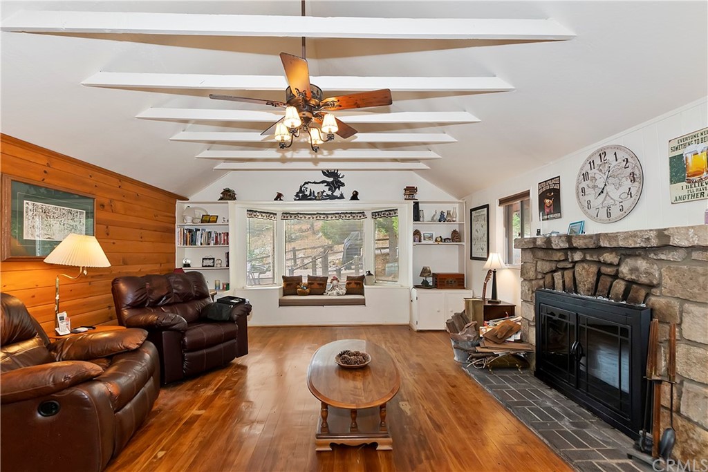1211 Bridal Path Rimforest, CA 92378 - Photo 12 of 28 a living room with furniture and a fireplace