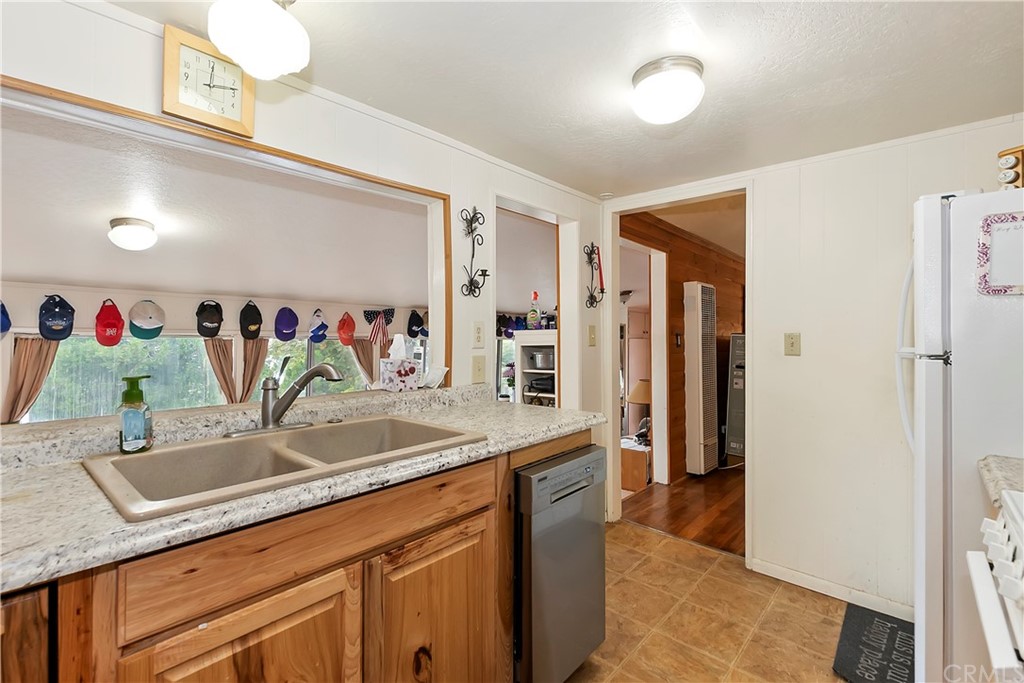 1211 Bridal Path Rimforest, CA 92378 - Photo 14 of 28 a bathroom with a sink and a mirror