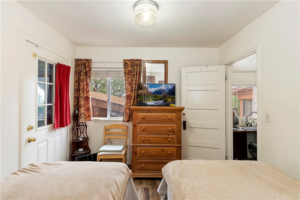 1211 Bridal Path Rimforest, CA 92378 - Photo 24 of 28 a bedroom with a bed and a closet