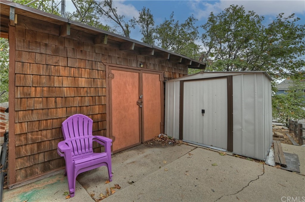 1211 Bridal Path Rimforest, CA 92378 - Photo 26 of 28 a view of backyard with outdoor seating and plants