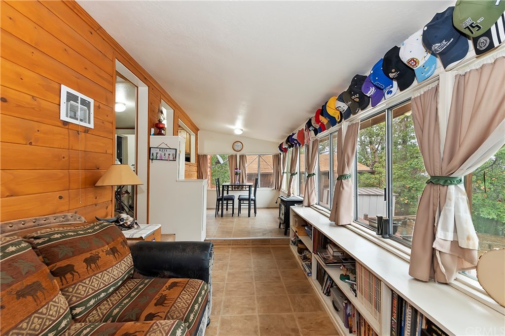 1211 Bridal Path Rimforest, CA 92378 - Photo 5 of 28 a view of an chairs and tables in the balcony
