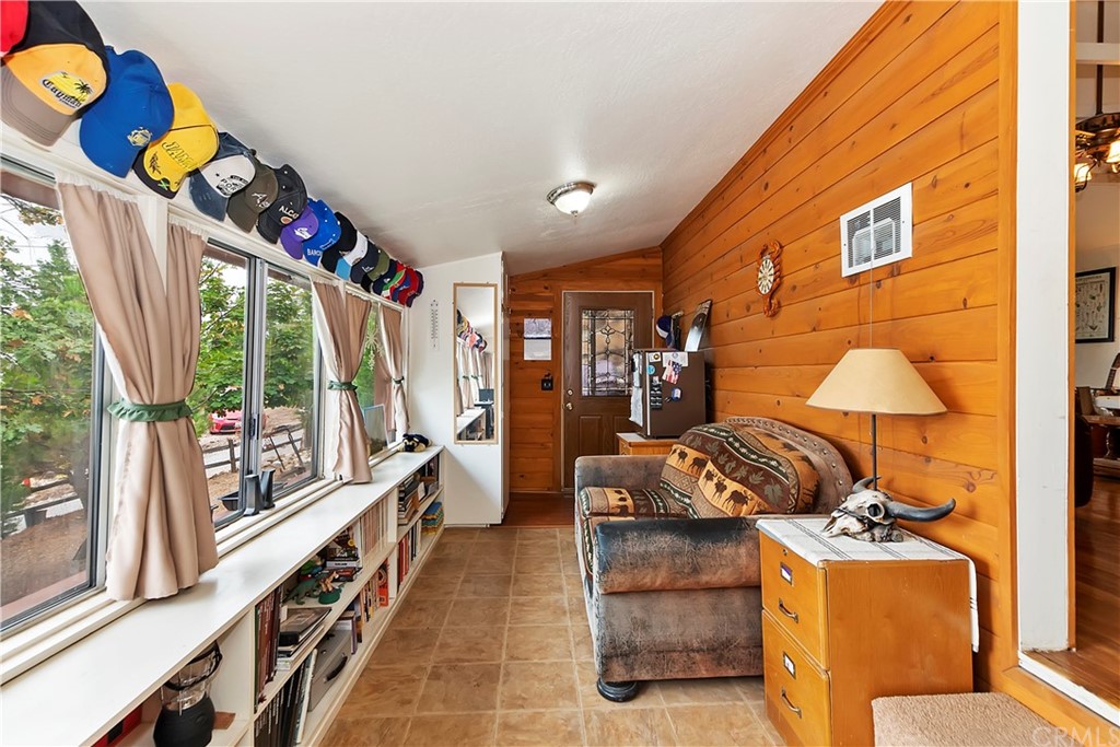 1211 Bridal Path Rimforest, CA 92378 - Photo 8 of 28 a living room with furniture and a large window