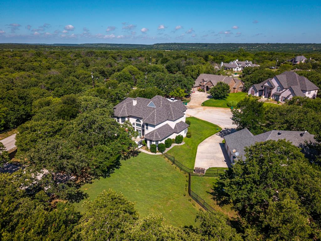 100 Manders Court Runaway Bay, TX 76426 - Photo 33 of 33 an aerial view of house with yard swimming pool and outdoor seating