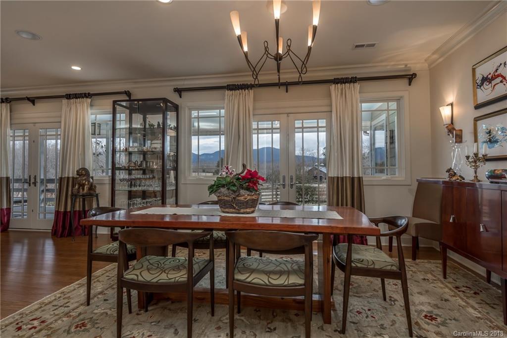 485 North Campbell Road Landrum, SC 29356 - Photo 12 of 22 a dining room with furniture window and wooden floor