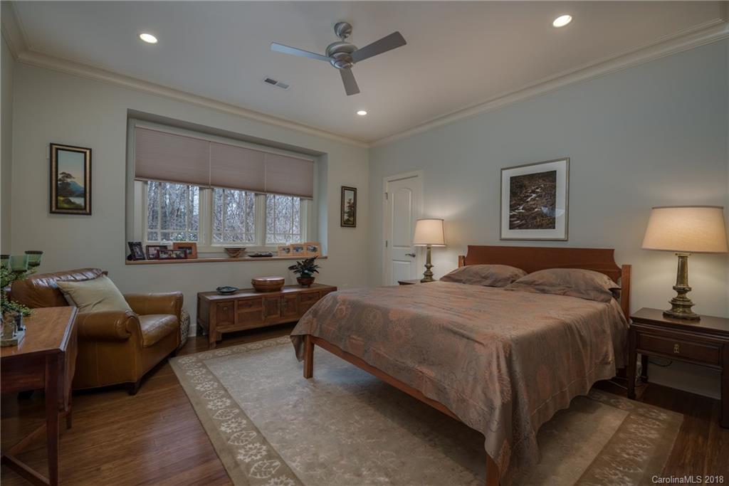485 North Campbell Road Landrum, SC 29356 - Photo 13 of 22 a bedroom with a bed a couch and dresser
