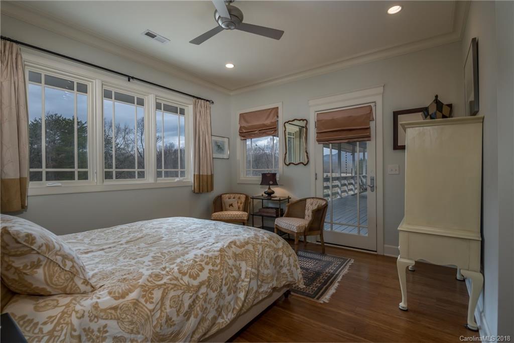 485 North Campbell Road Landrum, SC 29356 - Photo 14 of 22 a bedroom with a bed couch and a window