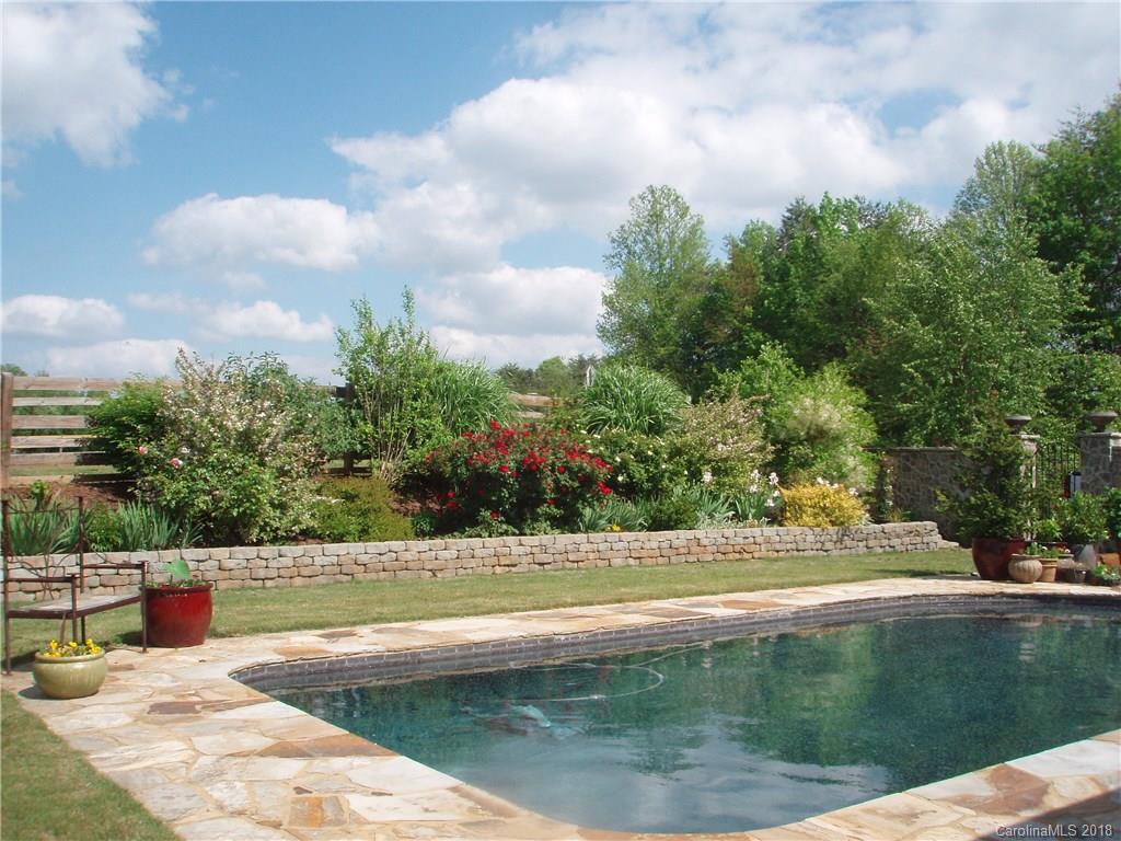 485 North Campbell Road Landrum, SC 29356 - Photo 21 of 22 a view of a swimming pool with a backyard