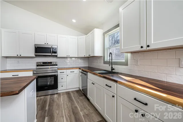 a view of small space with wooden floor