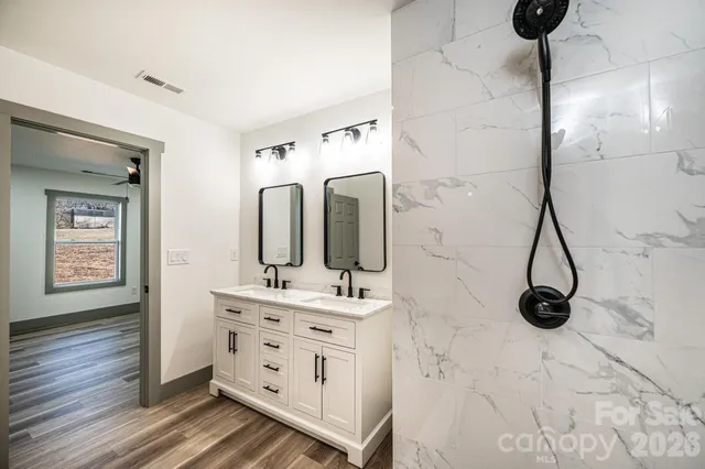 a view of balcony with wooden floor