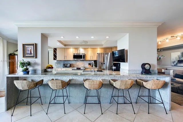 a view of a dining room kitchen and a counter top space