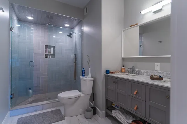 a view of balcony with wooden floor