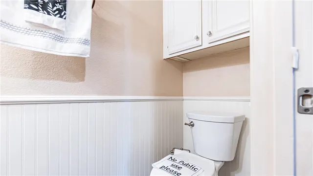 a view of entryway with wooden floor and door