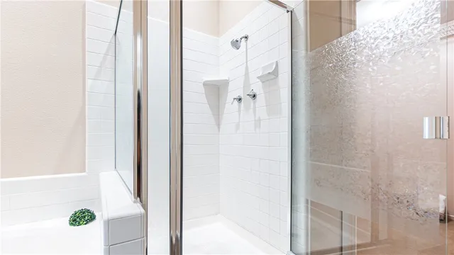 a bathroom with a sink vanity granite and a mirror