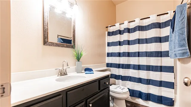 a view of swimming pool with a patio