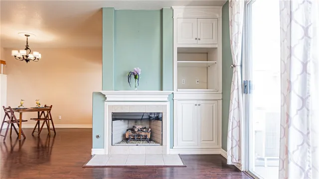 a view of livingroom and dining room with wooden floor