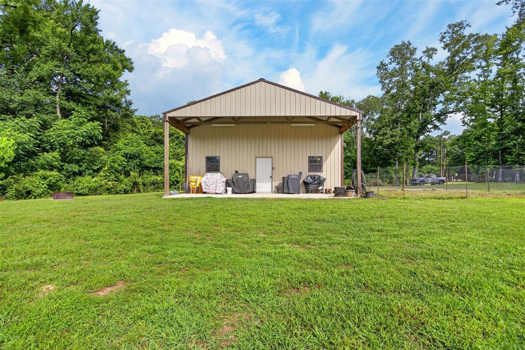 11868 Timber Ridge Drive Keithville, LA 71047 - Photo 33 of 37 1806 square foot workshop with electricity