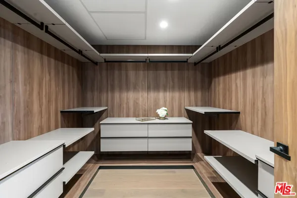 a spacious bathroom with a bathtub and shower