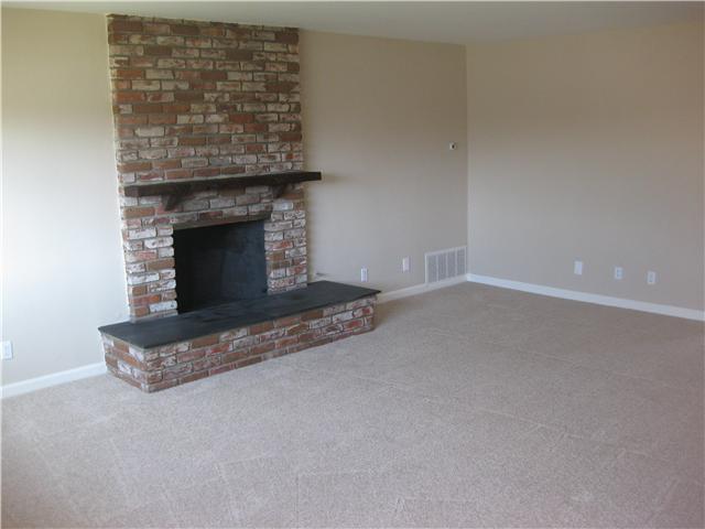 143 Valpreda Road San Marcos, CA 92069 - Photo 5 of 22 Large living room with fire place