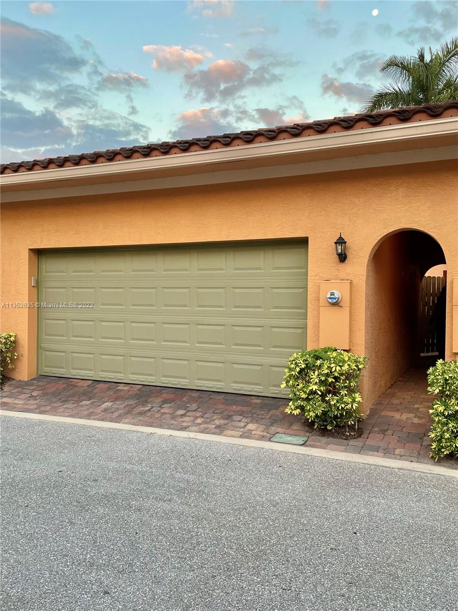 128 Midleton Way Jupiter, FL 33458 - Photo 23 of 39 a front view of a house