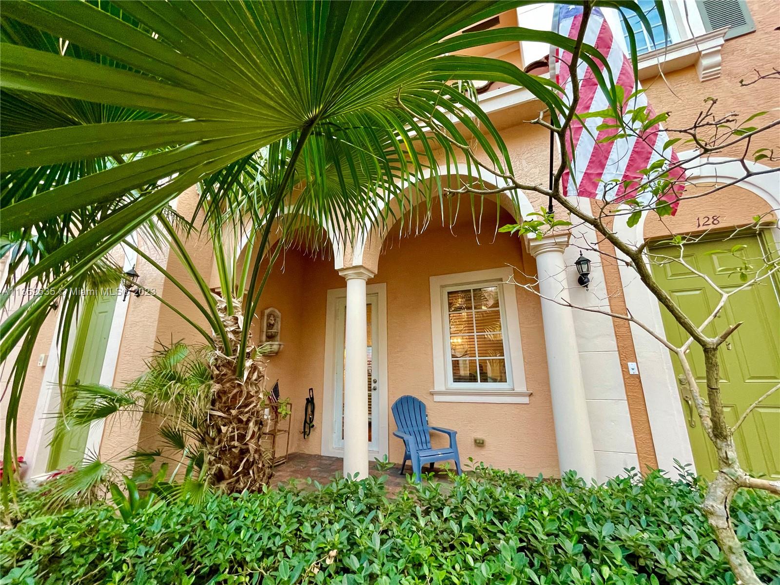 128 Midleton Way Jupiter, FL 33458 - Photo 4 of 39 a front view of a house with balcony
