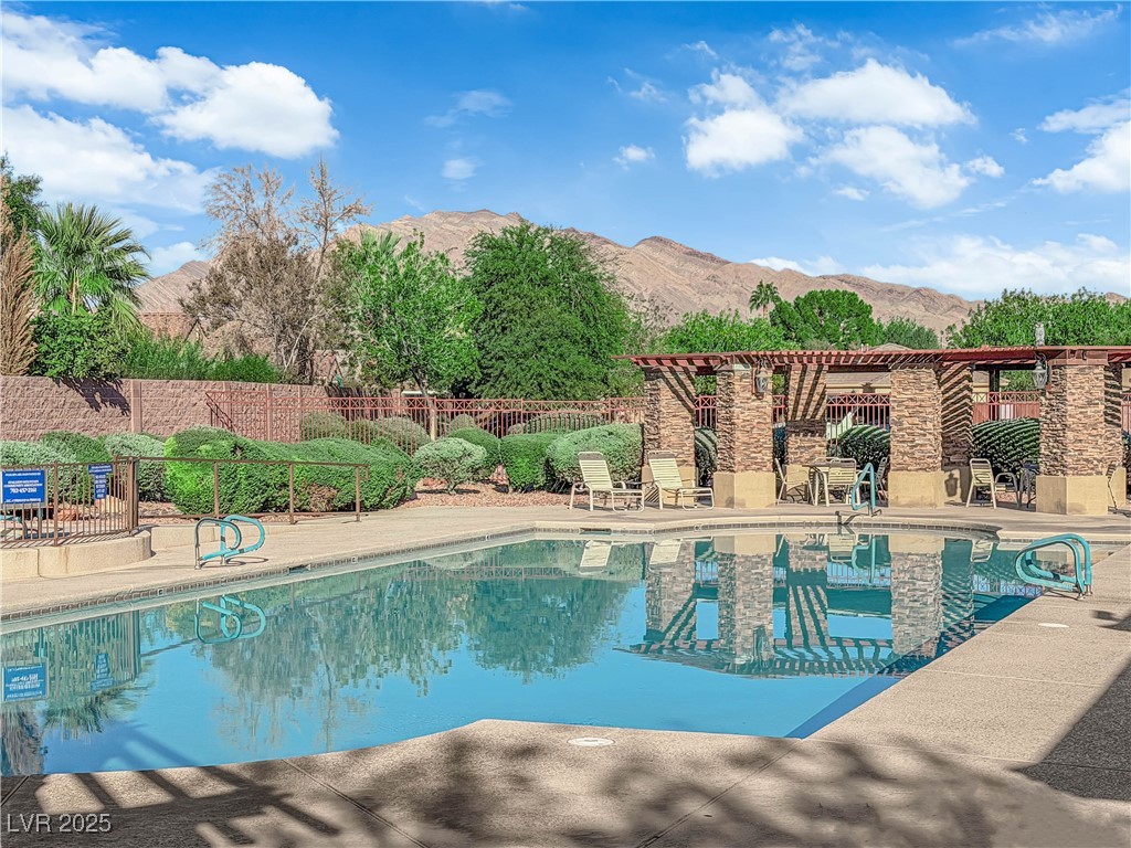 3486 Osprey Ridge Court Las Vegas, NV 89122 - Photo 38 of 49 Community pool just around the corner from the house