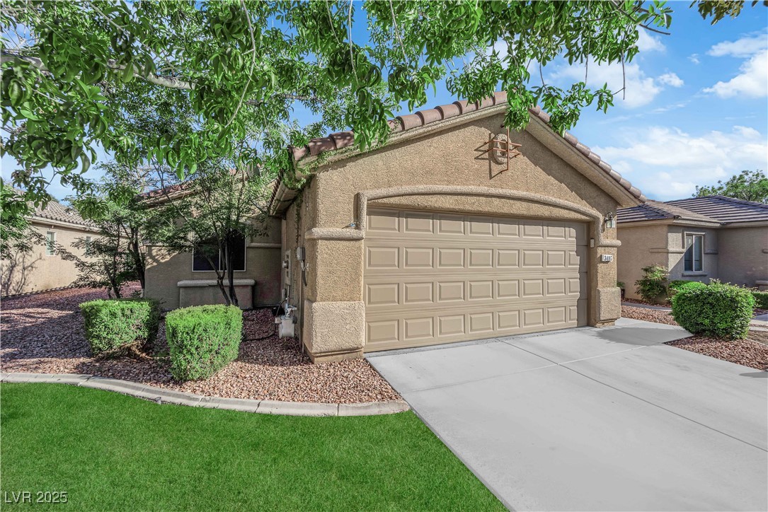 3486 Osprey Ridge Court Las Vegas, NV 89122 - Photo 6 of 49 Virtually staged. Artificial grass installed soon!