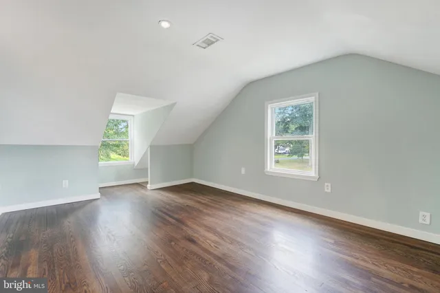a view of a hallway with washer and dryer