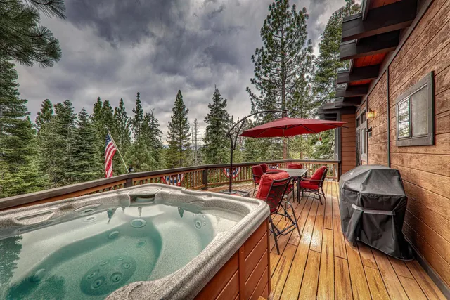 swimming pool view with a seating space