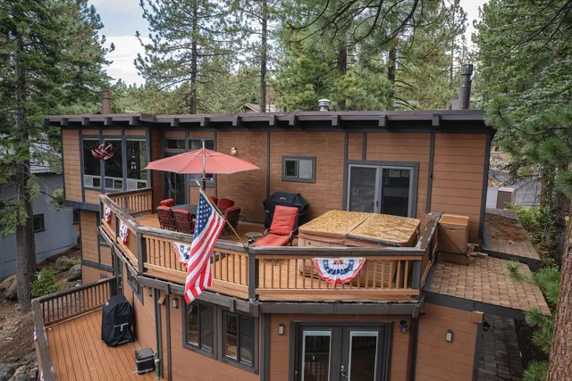 a dinning table under an umbrella