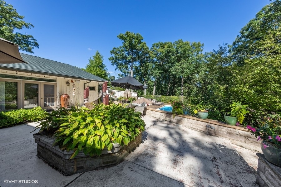 6547 South County Line Road Burr Ridge, IL 60527 - Photo 15 of 24 a view of a back yard of the house