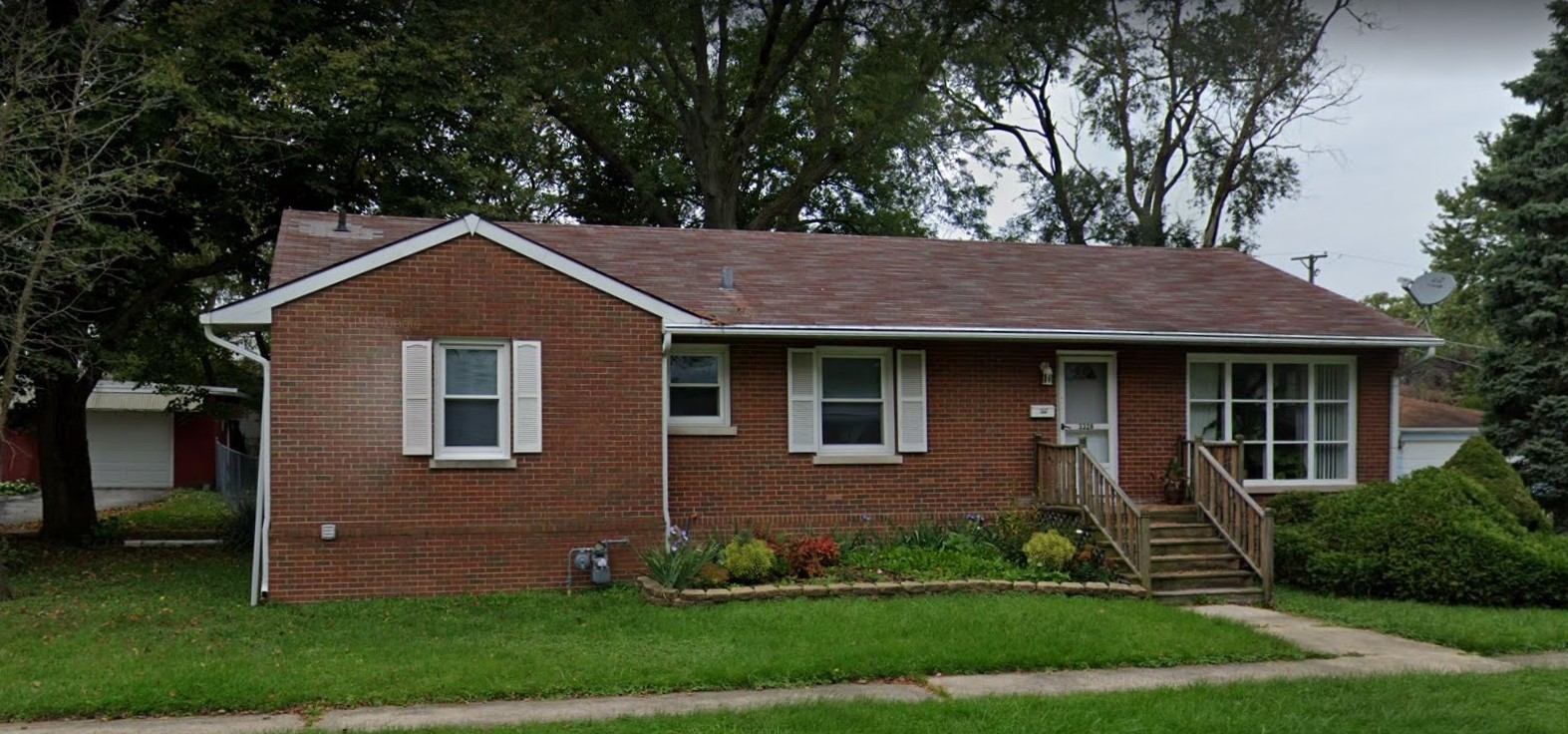 3328 Butler Avenue Steger, IL 60475 - Photo 2 of 22 a front view of a house with a yard