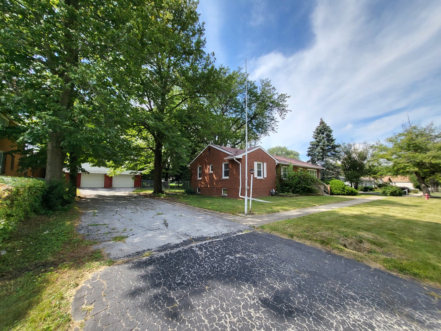 3328 Butler Avenue Steger, IL 60475 - Photo 3 of 22 a view of a house with backyard and trees