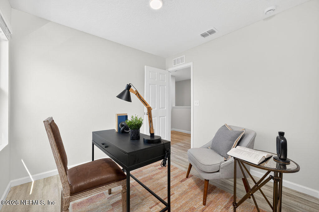 857 Jackson Road Jacksonville, FL 32225 - Photo 21 of 29 a view of a workspace with furniture