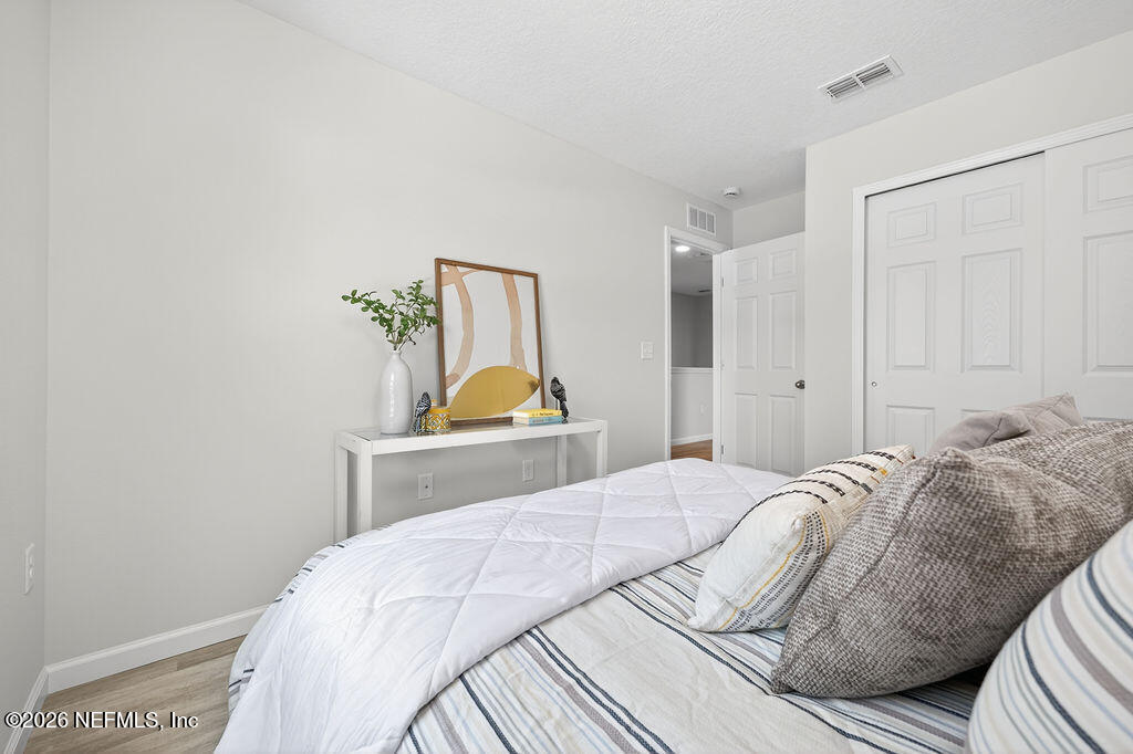 857 Jackson Road Jacksonville, FL 32225 - Photo 24 of 29 a bedroom with a bed and a window