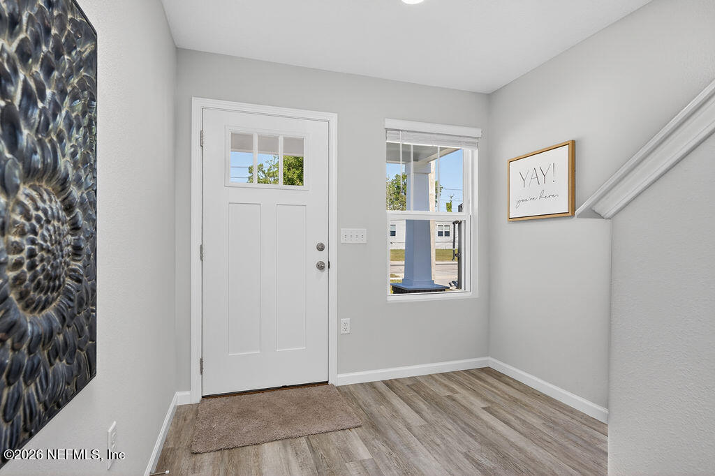 857 Jackson Road Jacksonville, FL 32225 - Photo 6 of 29 an empty room with windows