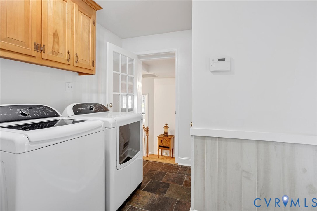 307 North Wilkinson Road Richmond, VA 23227 - Photo 26 of 48 Laundry room featuring cabinet space, washing mach