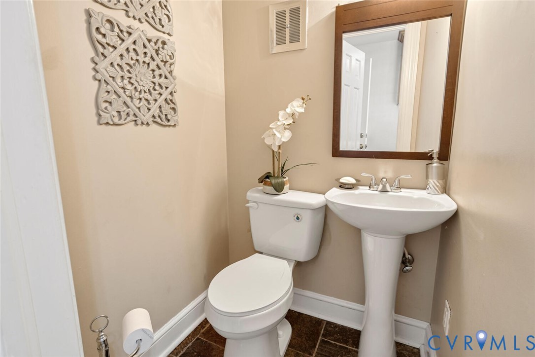 307 North Wilkinson Road Richmond, VA 23227 - Photo 27 of 48 Half bathroom off kitchen
