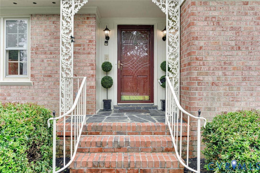 307 North Wilkinson Road Richmond, VA 23227 - Photo 3 of 48 Property entrance featuring brick siding