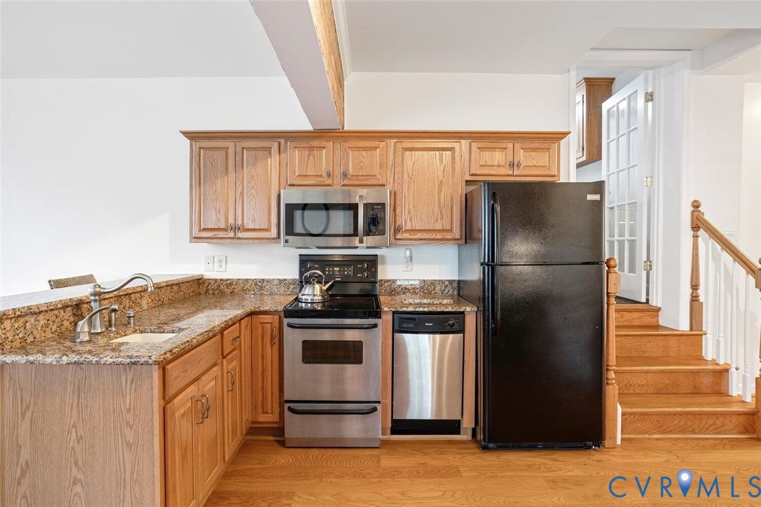 307 North Wilkinson Road Richmond, VA 23227 - Photo 34 of 48 Suite Kitchen featuring appliances with stainless