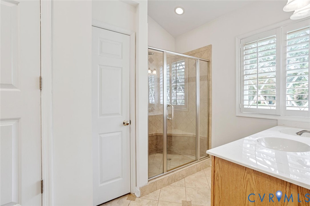 307 North Wilkinson Road Richmond, VA 23227 - Photo 39 of 48 Guest Suite Bathroom featuring a shower stall, til